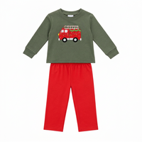 A two-piece children's outfit set featuring an olive green long-sleeve top with a red fire truck graphic on the chest, paired with bright red pants, shown against a plain white background.