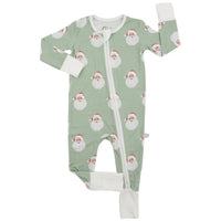 A baby long-sleeve footed sleeper in sage green with an all-over Santa Claus face print, featuring white cuffs, a white zipper, and white foot covers, shown on a plain white background. | Boys Sleigh Bells Double Zipper Romper by Hamner Hill