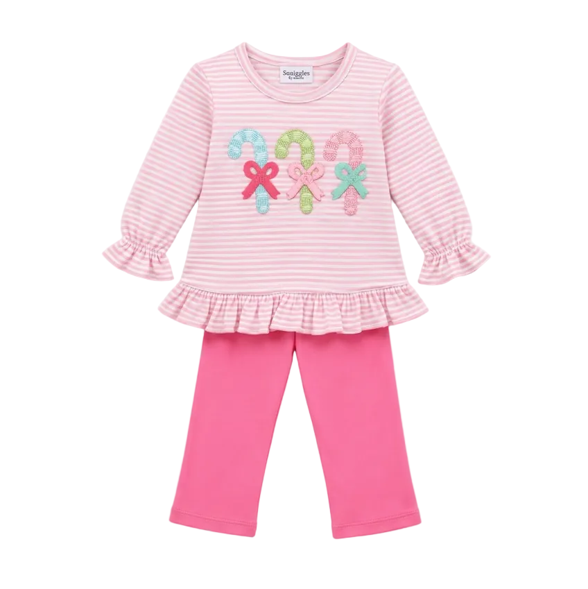 A toddler girl's two-piece outfit set featuring a pink and white striped long-sleeve top with a ruffled hem and a candy cane applique design, paired with solid hot pink pants.