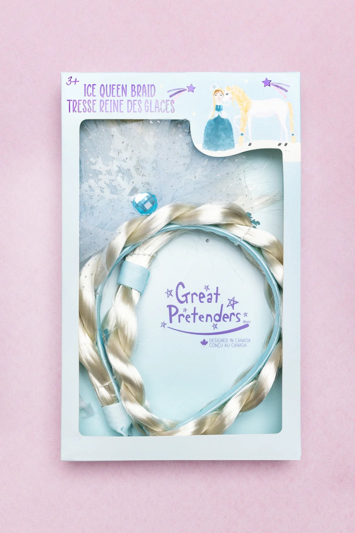 Packaged hair accessory with 'The Great Pretenders' branding on a pink background