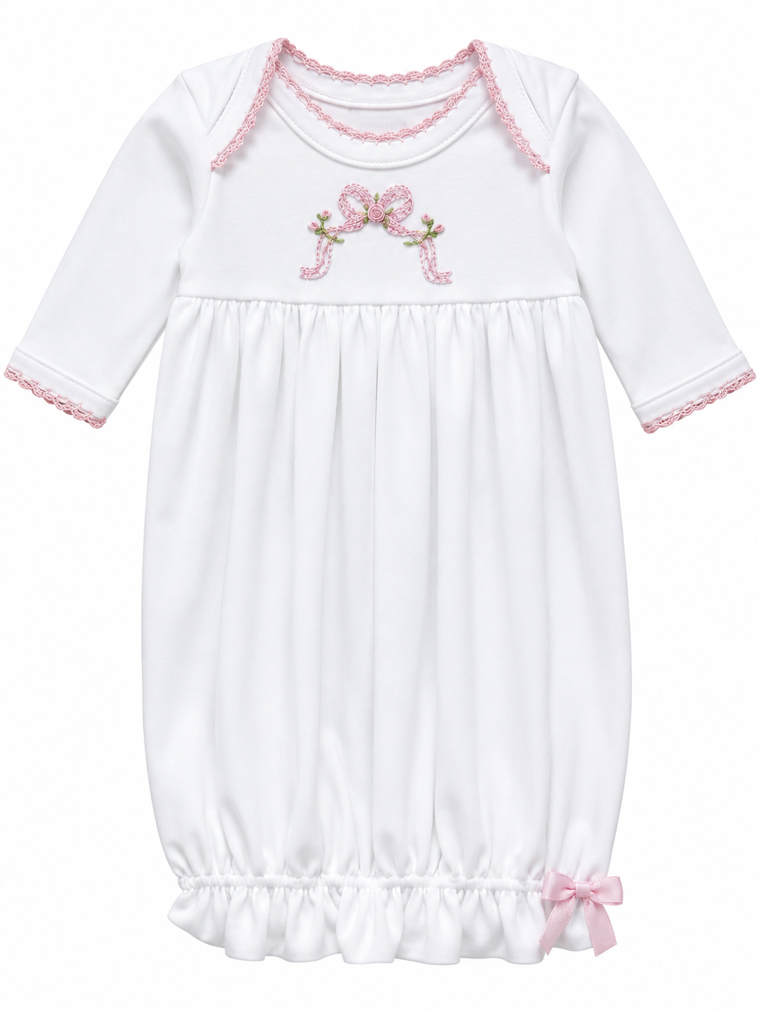A white long-sleeve baby dress with pink lace trim, a pink bow and floral embroidery on the chest, and a ruffled hem with a small pink bow, shown on a plain white background.