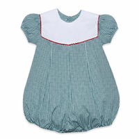 A baby bubble romper in a green and white gingham pattern with a solid white bib collar trimmed in red, featuring short puff sleeves and a gathered bottom.