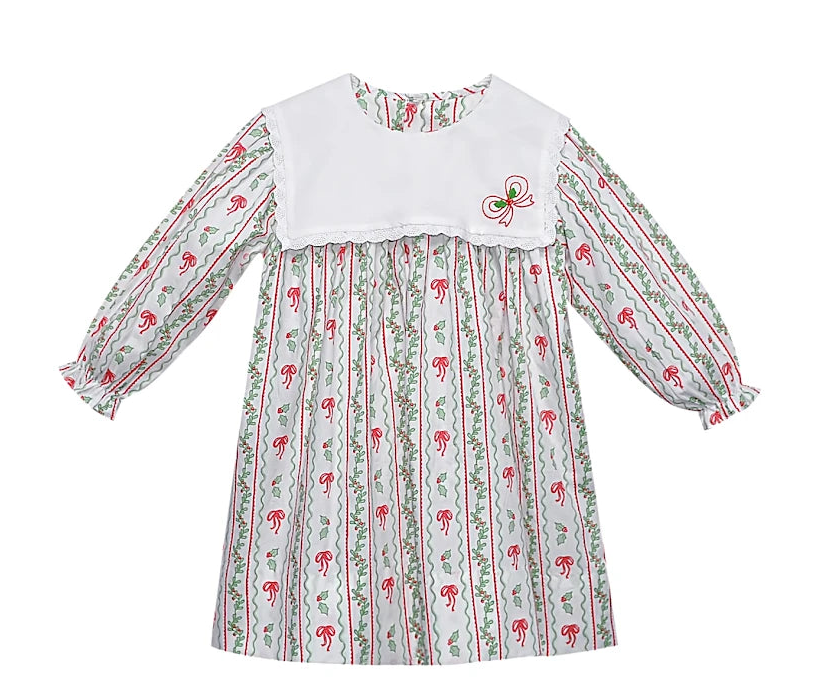 Children's dress with floral and striped pattern on a white background
